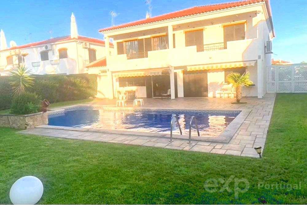 3 bedroom villa with large garden, swimming pool and garage.