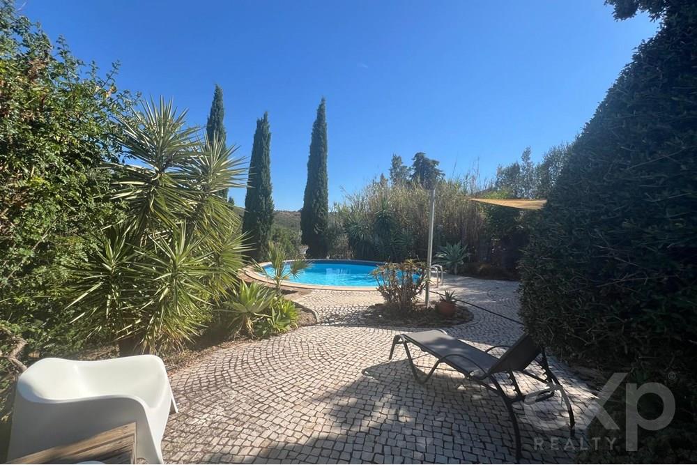 Three bedrooms, two bathrooms, charming algarvian style property with a swimming pool, sitting on a large plot  close to Santa Catarina, Tavira. Quiet neighbourhood, stunning surroundings.